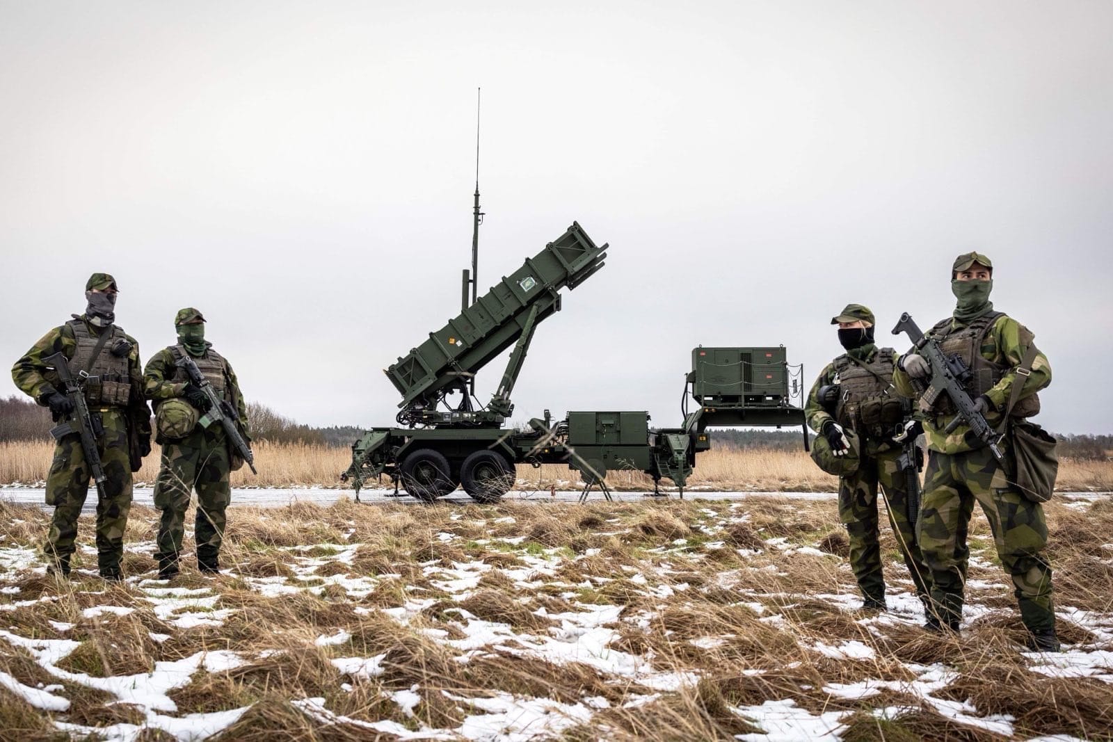 Swedish Patriot Air Defense System behind Swedish Soldiers