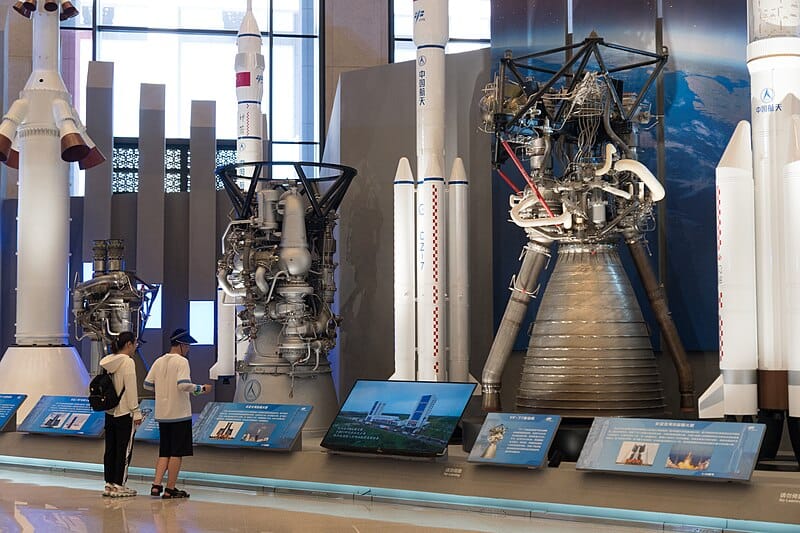 Three rocket engines used by the China Manned Space Program displayed at the National Museum of China. From left to right: YF-20, YF-100, YF-77